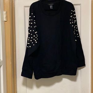 Black sweatshirt with pearl detail